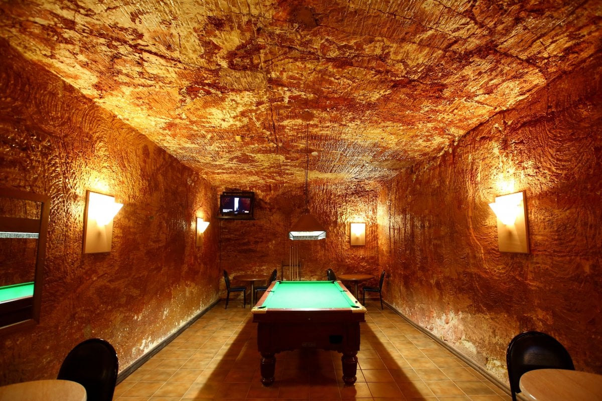 Elsewhere around the town, inhabitants and visitors alike can enjoy a game of pool ...