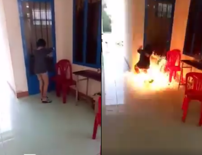 Hình ảnh cô gái mang xăng đến đốt trường sau khi tuyên bố trên facebook "nói là làm" nếu được 1.000 like. (Ảnh cắt từ clip)